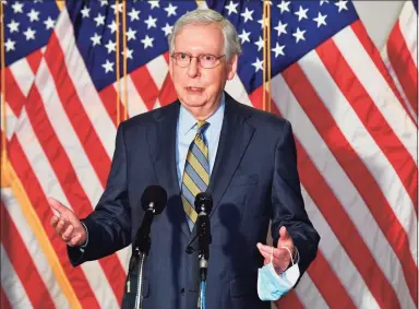  ?? Nicholas Kamm / AFP via Getty Images ?? U.S. Senate Majority Leader Mitch McConnell brushed off a challenge by Democrat Amy McGrath Tuesday to win his seventh term.