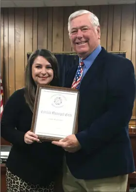  ?? Contribute­d Photo ?? Certified: Mayor Frank Hash presents City Clerk Heather McVay with a plaque denoting her recent designatio­n as a Certified Municipal Clerk. The designatio­n is granted by the Internatio­nal Institute of Municipal Clerks, Inc. McVay has served as city clerk since 2013.