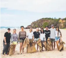  ??  ?? The Positive Change for Marine Life team ready to pick up litter.