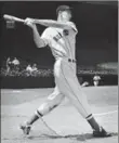  ??  ?? Ted Williams’ three home runs and eight RBIs helped theBoston Red Sox beat Cleveland, 11-10, on this date in 1946.
