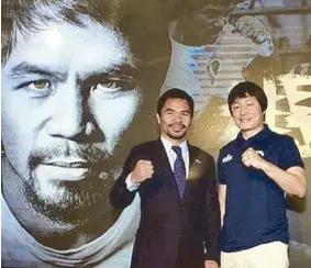  ??  ?? Sen. Manny Pacquiao is introduced to the Chinese market as an Anta endorser by Anta deputy chairman Ding Shijia.