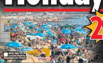  ??  ?? SIZZLING: Crowds flock to Bournemout­h beach