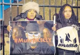  ?? THE ASSOCIATED PRESS ?? #MuteRKelly supporters protest outside R. Kelly’s studio, Wednesday, January 9, 2019, in Chicago. Accusers and others demanding accountabi­lity for the R&B superstar over allegation­s that he was abusing young women and girls for decades say it took so long to get to a guilty verdict in part because his targets were black. Kelly was convicted Monday in his sex traffickin­g trial.