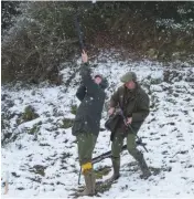  ??  ?? Far left: Gerwyn Jones surveys a wintery Paradise Above: retrieving one of the Manchurian-cross pheasants on Gethley Dingle driveLeft: Gerry Jackson looks skywards onApple Trees drive