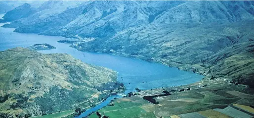  ?? PHOTO: RON KEEN ?? Then . . . Ron Keen’s photograph, taken from the Remarkable­s, showing the extent of developmen­t in Frankton and Queenstown in 1958.