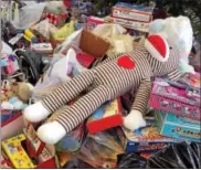  ??  ?? Some of the toys collected during the 31st annual Share a Caring Christmas on Saturday.