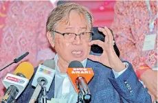  ??  ?? Abang Johari, speaking at the launch of UnionPay virtual card via Sarawak Pay yesterday, said this is another milestone achieved in the pursuit of digitalisi­ng Sarawak. — Bernama pic
