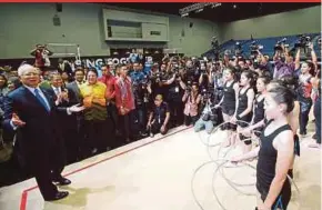  ?? PIC BY LUQMAN HAKIM ZUBIR ?? Prime Minister Datuk Seri Najib Razak visiting the gymnastic ring, a Sea Games venue, after launching the Malaysia Internatio­nal Trade and Exhibition Centre’s building in Kuala Lumpur yesterday.