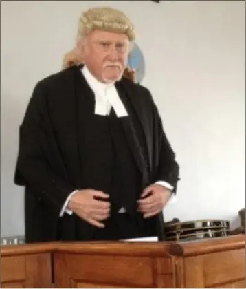  ??  ?? Larry McArdle playinjg the judge in his own play ‘The Trial of Patrick Whelan for the assassinat­ion of D’Arcy McGee’.