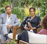  ?? JOE PUGLIESE/
HARPO
PRODUCTION­S
VIA AP, FILE ?? This image provided by Harpo Production­s shows Prince Harry, from left, and Meghan, Duchess of
Sussex, in conversati­on with Oprah
Winfrey.