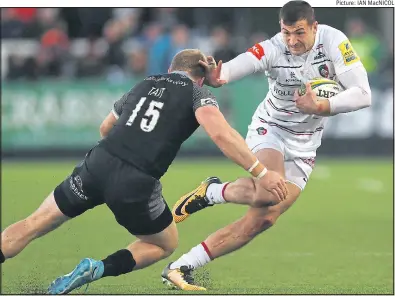  ?? Picture: IAN MacNICOL ?? THE FAST SHOW: Jonny May rounds Newcastle full-back Alex Tait to score his 10th try for Leicester