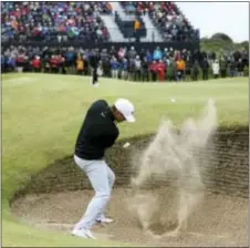  ?? PETER MORRISON — THE ASSOCIATED PRESS ?? Brooks Koepka of the United States plays out of a bunker on the 7th hole during the first round of the British Open.