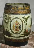  ??  ?? Cash on the barrel: A Regency oak cask with a crest sold for £4,200