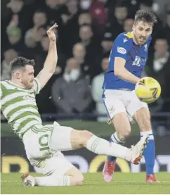  ?? ?? Callum Booth vies with Celtic’s Anthony Ralston at Hampden