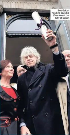  ??  ?? Bob Geldof handing back his Freedom of the City of Dublin