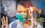  ?? AFP ?? A Burmese migrant in Thailand attends a memorial in Bangkok to honour protesters who died during rallies in Myanmar.