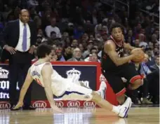  ?? JAE C. HONG/THE ASSOCIATED PRESS ?? The Raptors stumbled when they reverted to a one-on-one offensive approach Monday. "We’ve got to learn from it," said Kyle Lowry, right.