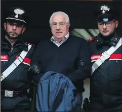  ?? — ANSA VIA AP ?? Settimo Mineo is escorted by Carabinier­i police in Palermo, Sicily, yesterday after an anti-Mafia operation.