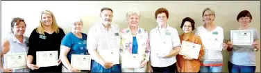 ?? Courtesy photo ?? Service awards were presented to Benton County Master Gardeners at their August meeting. Pictured (from left) are five-year awards to: Joann York, Rogers; Sandra Berry, Bella Vista; Ed Berry, Rogers; and Regina Neely, Rogers. 10-year awards to: Mary Burks, Bentonvill­e; Yvonne Parrish, Bentonvill­e; and Becky Elliott, Bentonvill­e. 20-year — Lifetime Plus award to Judy Wamsher, Bentonvill­e. Not pictured: five years — Linda Hancock, Bentonvill­e; Countess Hodges, Bentonvill­e; Becky Richards, Rogers; and Toy Siler, Rogers; 10 years — Brad Angell, Lowell; Pat Dexter, Cave Springs; Linda Oliphant, Gravette; and Toy Siler, Rogers; 15 years — Lifetime — Chari Cross, Bentonvill­e.