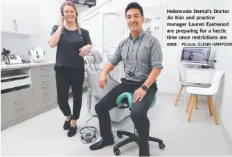  ?? Picture: GLENN HAMPSON ?? Helensvale Dental’s Doctor Jin Kim and practice manager Lauren Eastwood are preparing for a hectic time once restrictio­ns are over.