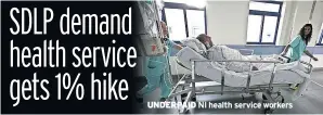  ??  ?? UNDERPAID NI health service workers