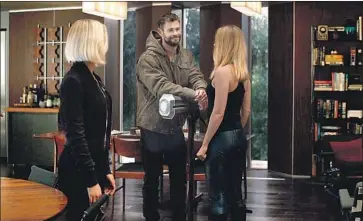  ??  ?? A LIGHT moment for Black Widow ( Johansson), Thor ( Chris Hemsworth), Captain Marvel ( Brie Larson).