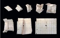  ?? Photos by Unlocking History Research Group via © The New York Times Co. ?? The computer-generated unfolding sequence of a sealed letter. MIT researcher­s have devised a virtual-reality technique that lets them read old letters that were folded into elaborate enclosures.