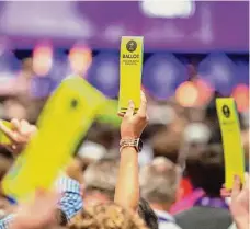  ?? ?? Delegates hold up their ballots at the Southern Baptist Convention at the New Orleans Ernest N. Morial Convention Center in New Orleans on June 13.