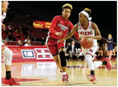  ?? CONTRIBUTE­D ?? Miami point guard Lauren Dickerson has scored in double digits in 33 straight games.