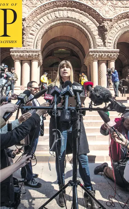  ?? MARK BLINCH / THE CANADIAN PRESS ?? Complainan­t Kathryn Borel, a former colleague of Jian Ghomeshi who accused him of sexually assaulting her, speaks to the media after the former CBC star agreed to a peace bond in Toronto on Wednesday.