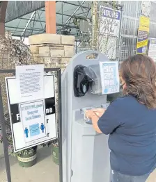  ??  ?? Nick’s Garden Center and Farm Market in Aurora installed a hand-washing station at its store.