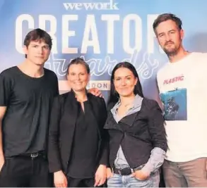  ??  ?? APPY DAYS Loral and Eshel with Ashton Kutcher and We Work co-founder Miguel McKelvey