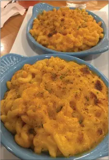  ?? PEG DEGRASSA - MEDIANEWS GROUP ?? Chef Reeky’s own five cheeze Mac-n-Cheese is as creamy and rich as the traditiona­l macaroni and cheese variety. It’s one of the Cheezy Vegan’s most popular menu items.