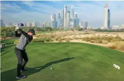  ??  ?? CLOCKWISE FROM TOP: TIGER WOODS ATOP THE BURJ AL ARAB IN 2004; RORY MCILROY IS A TWO-TIME CHAMP ON THE MAJLIS; EMIRATES GOLF CLUB IN 1989