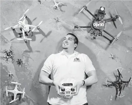  ?? Jon Shapley photos / Houston Chronicle ?? Robert Quarantell­o, owner of Space City Drones, says he started his business because “I kept crashing my own drone, and it was getting harder and harder to find parts. ... I knew if I was frustrated, other people were, too.”