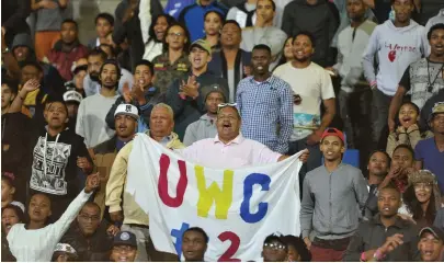  ?? SASPA ?? SING WHEN YOU’RE WINNING: UWC’s football and rugby teams’ successes have rekindled the sort of spirit on the stands not heard in Bellville since the 1980s.