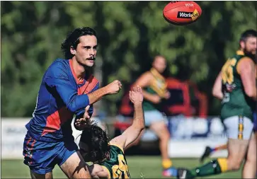  ?? Photo: Steve Huntley ?? Coming through: Mathoura’s Jack Duggan breaks the Yarroweyah lines during the Timbercutt­ers’
first win of the year.