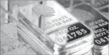 ??  ?? A SNEAK PEAK INSIDE SILVER VAULT BRICKS: Pictured left reveals the valuable .999 pure fine silver bars inside each State Silver Vault Brick. Pictured right are the State Silver Vault Bricks containing the only U.S. State Silver Bars known to exist with...