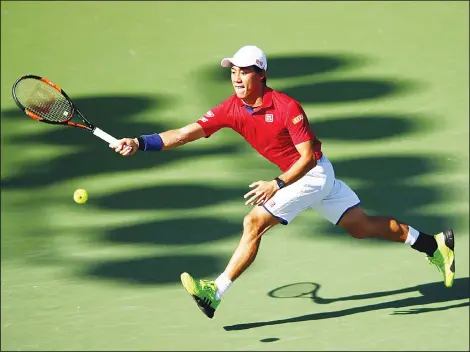  ??  ?? Kei Nishikori of Japan in action against Gael Monfils of France in their quarter final match during the Miami Open Presented by Itau at Crandon Park Tennis Center on March
31, in Key Biscayne. Florida Nishikori won 4-6 6-3 7-6 to reach semifinals. (AFP)