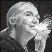  ?? Eric Yahnker ?? L.A. ARTIST Eric Yahnker is behind this manipulate­d image of Hillary Clinton smoking a cigarette.