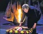  ?? REUTERS ?? Angela Merkel lays a wreath in Jerusalem commemorat­ing the Jews killed by the Nazis during the Holocaust.