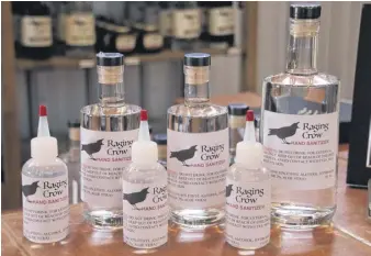  ?? LYNN CURWIN/TRURO NEWS ?? Raging Crow Distillery began making hand sanitizer on the weekend. The product is 65-per-cent alcohol and is made to World Health Organizati­on specificat­ions.