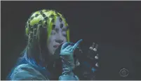  ?? (Reuters) ?? BILLIE EILISH performs during the awards show.