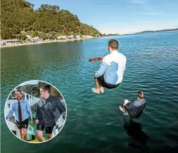  ?? ROSA WOODS/STUFF ?? Lower Hutt Mayor Campbell Barry, top and inset left, and Chris Bishop do a ‘‘manu’’ off the new Days Bay Wharf.