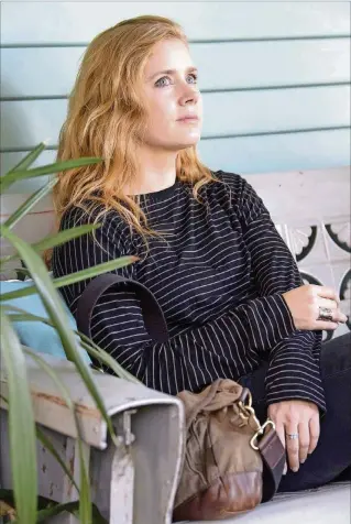  ?? PHOTO COURTESY OF HBO ?? Amy Adams plays Camille Preaker, an alcoholic reporter who returns to her hometown to cover a story about two missing young girls, in the HBO limited series “Sharp Objects.” Camille, who wears longsleeve­d shirts and pants consistent­ly throughout the show, displays a number of key self-harm warning signs.