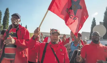  ?? Picture: Yeshiel Panchia ?? RED TIDE. Delegates arrive for the SA Communist Party Policy Conference in Boksburg yesterday. The annual conference will run until Thursday this week.