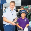  ?? ?? A student having fun at the Taupō Police stand, 2018.