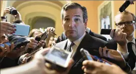  ?? TOM BRENNER / NEW YORK TIMES ?? U.S. Sen. Ted Cruz, R-Texas, speaks Thursday with reporters on Capitol Hill in Washington. Cruz had pushed for a provision in the new bill that allows people to buy stripped-down plans that don’t meet ACA standards.