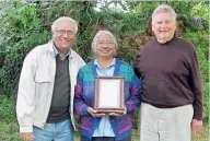  ??  ?? Prof. Savitri Gunatillek­e with her PhD “guru”, Prof. Peter Ashton, and her husband, Prof. Nimal Gunatillek­e, holding the plaque for the award of an Honorary Fellowship of the Associatio­n of Tropical Biology and Conservati­on