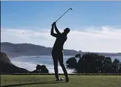 ?? Meg McLaughlin San Diego Union-Tribune ?? BRENT GRANT, who shared the first-round lead, tees off on the 16th hole at Torrey Pines Golf Course.